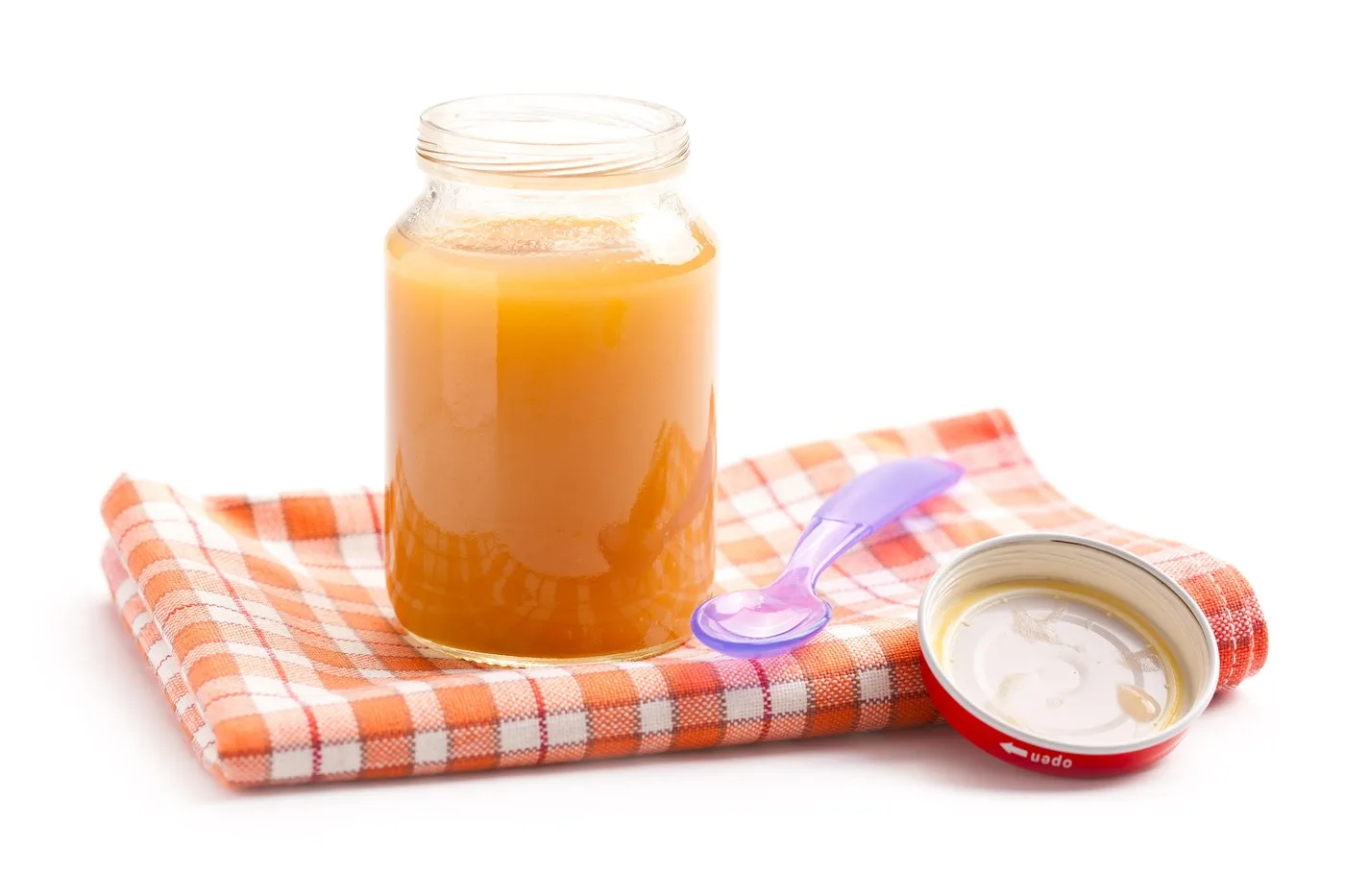Borcan cu alimente pentru bebeluși alături de etichete de avertizare privind siguranța alimentară